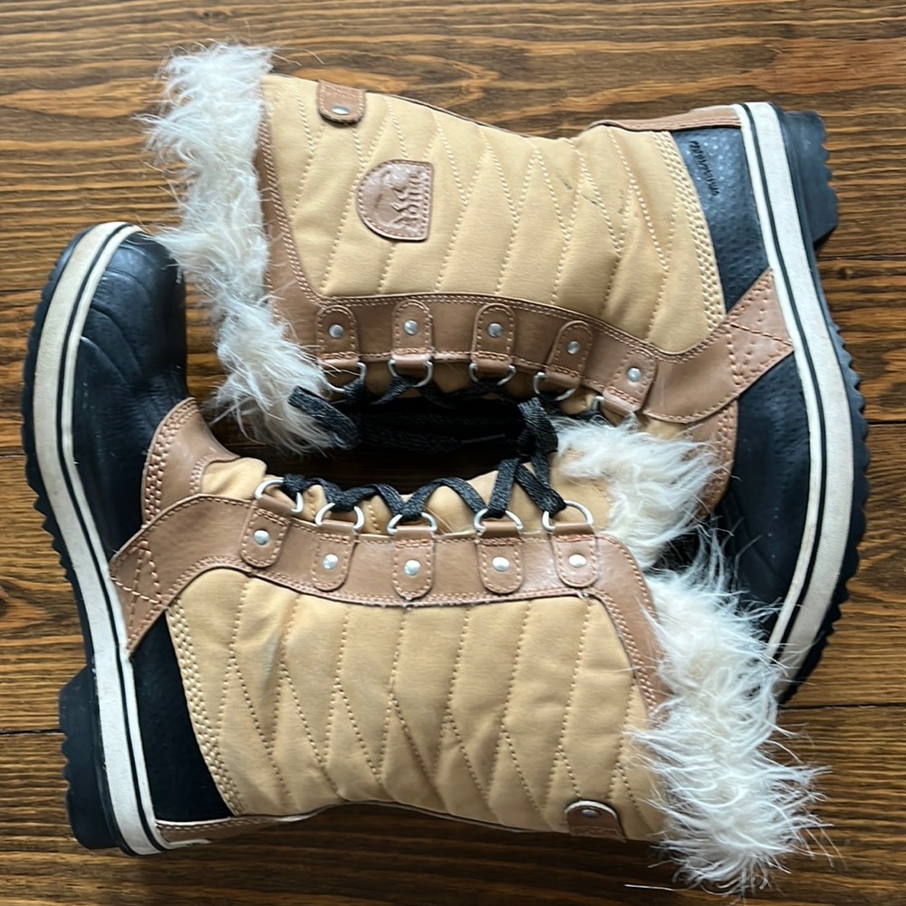 Size 7. SOREL winter boot. Tan and black. Waterproof.